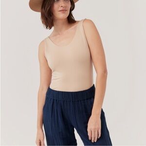 Pact Organic Cotton Bodysuit in Champagne - size M EUC
